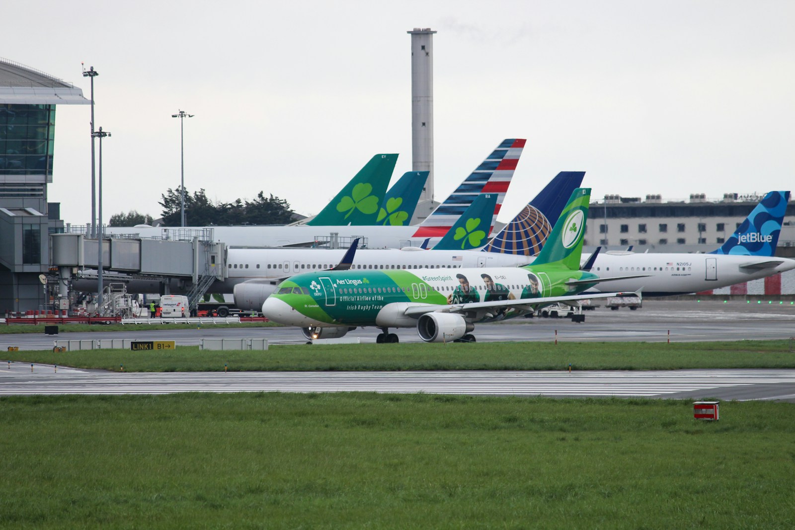 a group of airplanes that are sitting on a runway